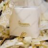 Close-up 3D wooden calligraphy and damask texturing on bid boxes