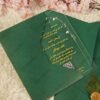 Close-up of Arabic calligraphy and gold vine border on acrylic card