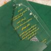 Green acrylic wedding card showing Mehandi Barat and Walima details