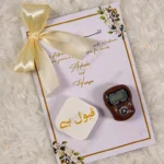 Close-up of luxurious hand-tied gold ribbon on custom favor card