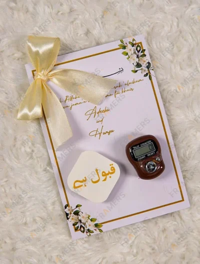 Close-up of luxurious hand-tied gold ribbon on custom favor card