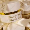 Personalised satin ribbon bow on cylindrical bid boxes