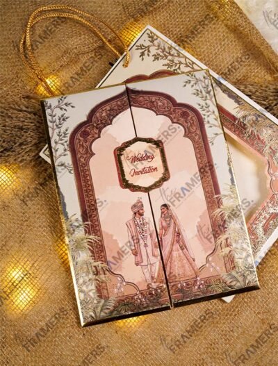 Close-up of traditional dholki and ghodi illustrations on wedding card