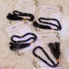 Elegant Nikkah favor cards designed to hold black pearl tasbeehs