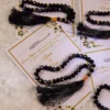 Premium black tasbeeh elegantly attached to customized wedding favor