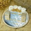 Custom mirror engagement ring tray with white roses, Quranic verse in gold calligraphy, pearl border, and personalized names