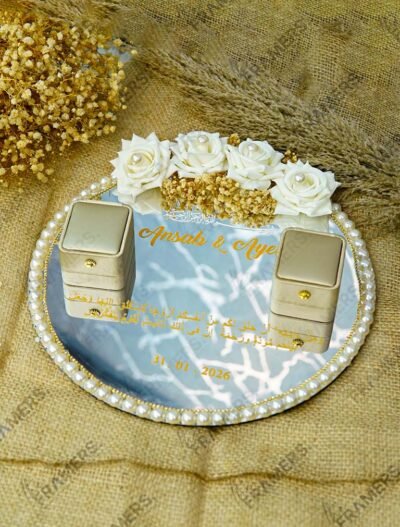 Custom mirror engagement ring tray with white roses, Quranic verse in gold calligraphy, pearl border, and personalized names