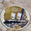 Close-up of pearl, rhinestone, and white flower border detail on mirror engagement tray