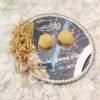 Full top view of mirror engagement ring tray with seashell boxes and dried flower bow