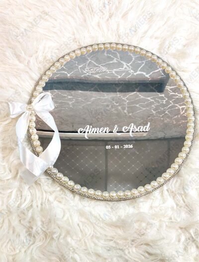 Minimalist mirror ring tray with pearl border, white satin bow, and Bismillah calligraphy with personalized names