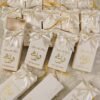 Gold foil Qubool Hai calligraphy on tall bid boxes sleeve