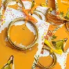 Multiple colorful bangle favor cards for pre-wedding celebrations