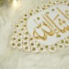 Pair of ivory and gold Mashallah Nikkah armbands for bride on white background