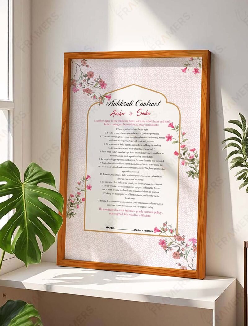Pink floral rukhsati wedding contract in natural wood frame with Islamic pattern